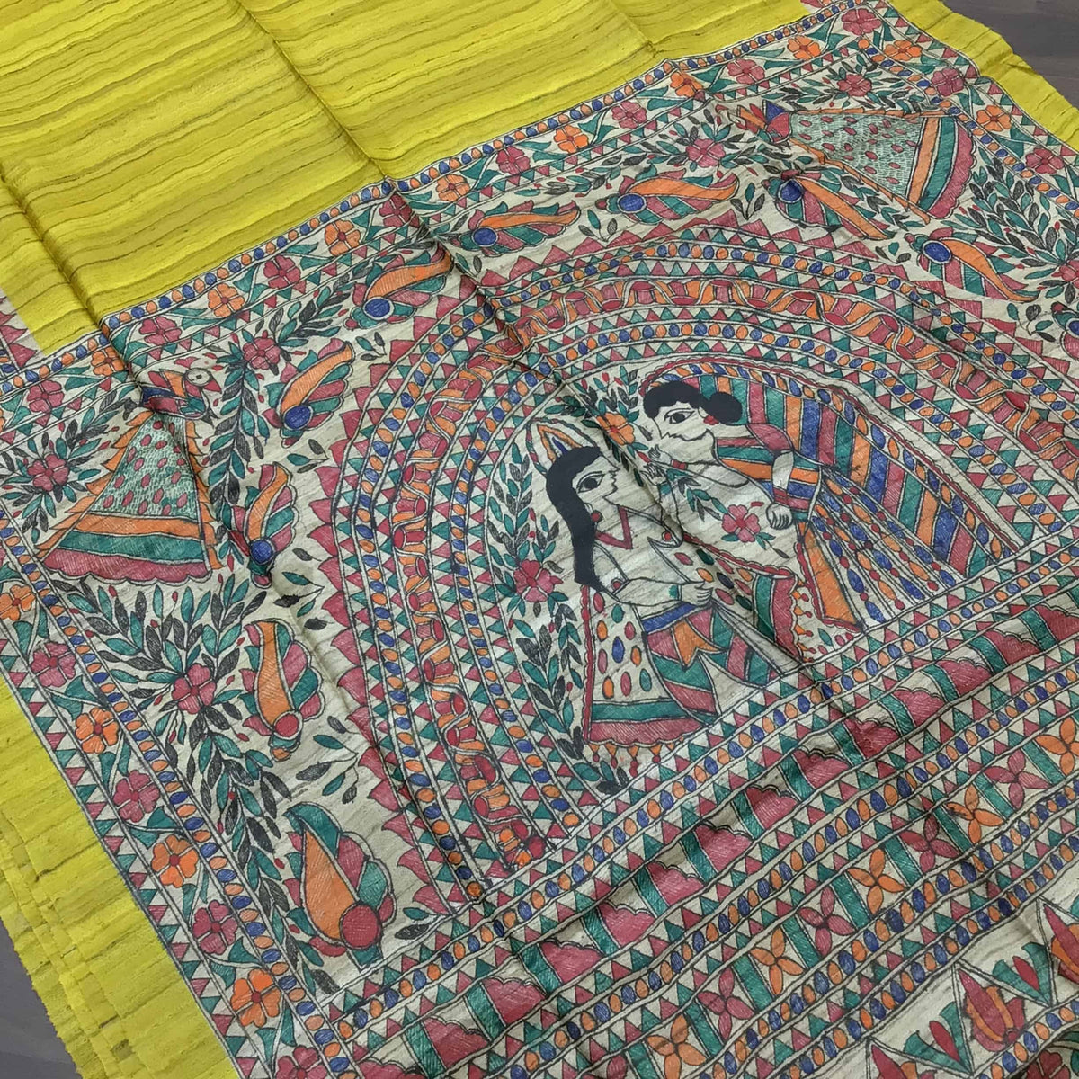 indiva-madhubani-hand-painted-yellow-ghicha-silk-saree-pallu.jpeg